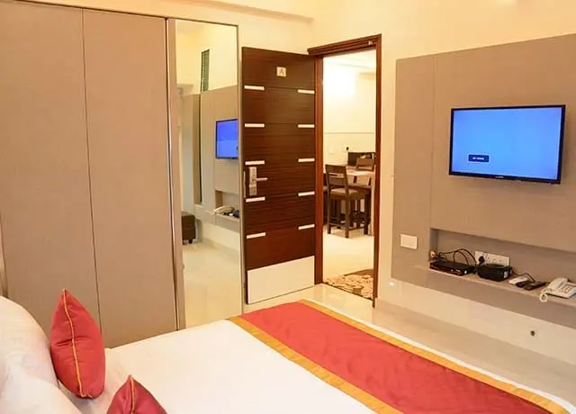 Orangery suite with bedroom, wardrobe and television